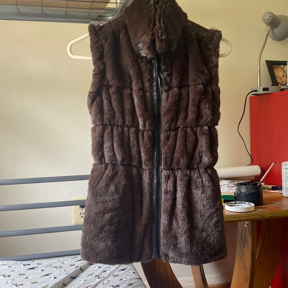 Brown reversible fuzzy vest with tags